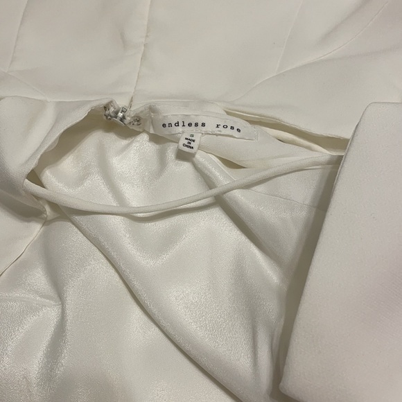 White backless dress with cutouts - Picture 5 of 5